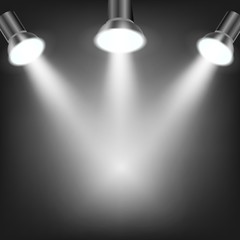 White spotlights in dark background