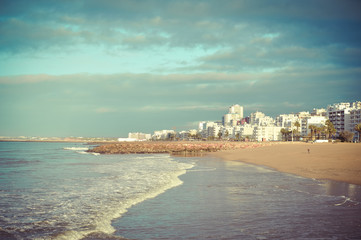 Picturesque view of beautiful sea resort with peopleless sandy beach