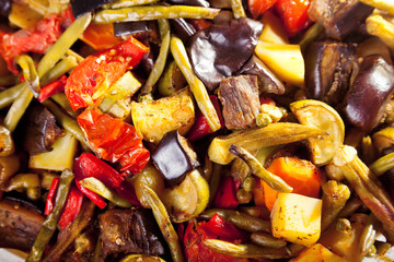 Casserole with eggplants, potatoes and zucchini