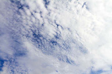 Cloudy bright sky, background.