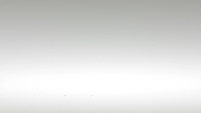 Super Slow Motion Brezil Nuts Falling on White Surface
