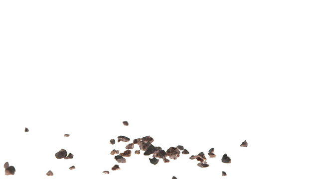 Super Slow Motion Cacao Nibs Falling on White Surface