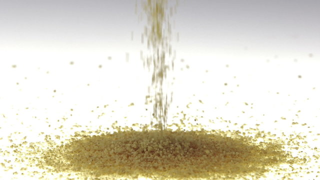 Super Slow Motion Couscous Falling on White Surface