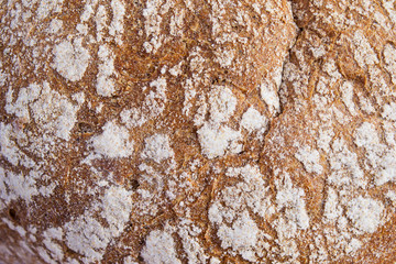The texture of rye bread with a crispy crust, top view