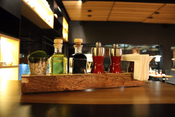 Styling set of spices and seasonings on the restaurant table
