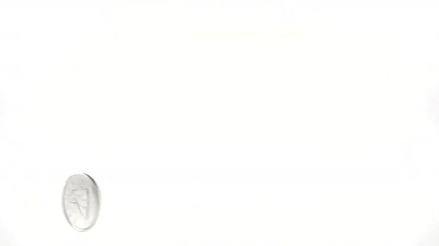 Super Slow Motion Dime Spinning on a White Background