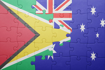 puzzle with the national flag of guyana and  australia