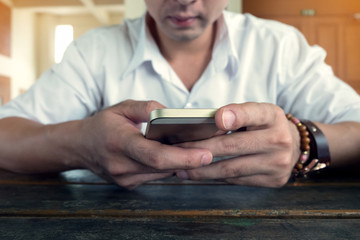 businessman using a mobile phone with texting message