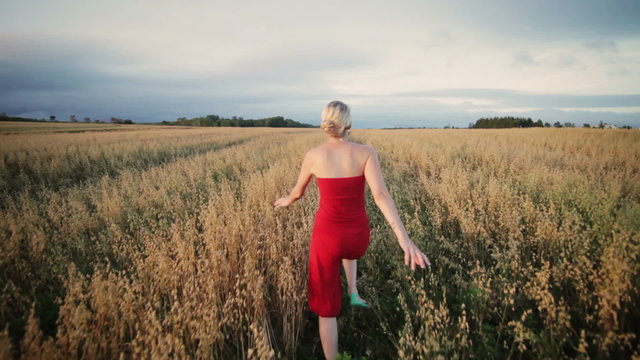 LIFE IS FUN !!! Happy Blonde Woman Running in Field with her Boyfriend