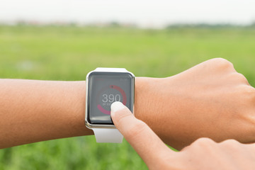 runner using hand watch check healthy application