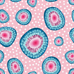 Zoanthid ocean creatures inspired 2D shapes organized into a repeat pattern with a pink and white polka dots background