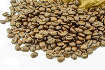 Roasted coffee beans and leaves dry