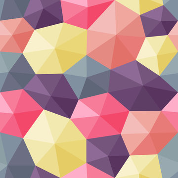 Seamless pattern created with faceted hexagons shaded to appear as 3D shapes.