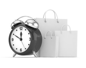 alarm clock and shopping bag (time to buy concept)