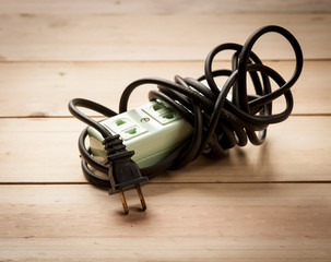 Electric extension strip on wood