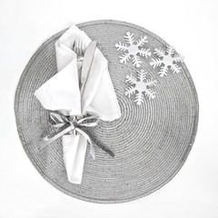 Knife and Fork on Silver placemat