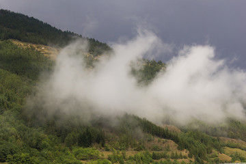 Fototapeta na wymiar Mountains with fog-2