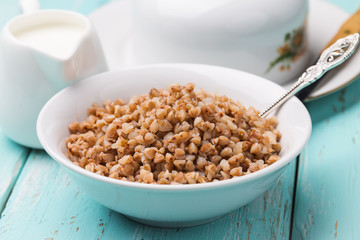 Buckwheat porridge with milk, closeup