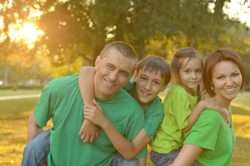 Fototapeta premium Family resting in a summer park