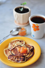 Tea and pancakes with jam for breakfast