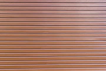 background of brown vinyl siding planks