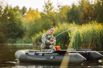 Women Fisherman on the lake background