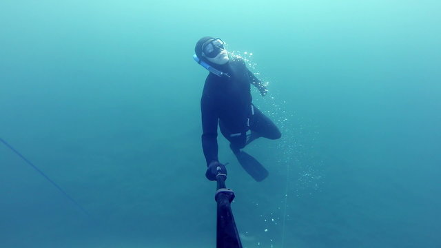 Freediver Resurfacing after a deep (20m) Dive