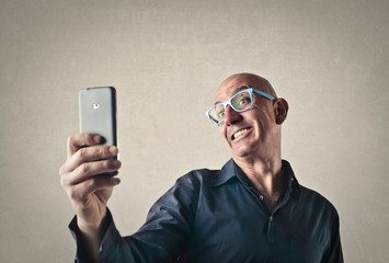 Smiling man doing a selfie