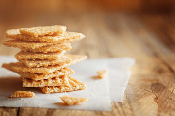 Chopped Candied  White Sesame Seeds in Stack on Wooden Background