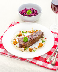 Grilled rump steak with chanterelles