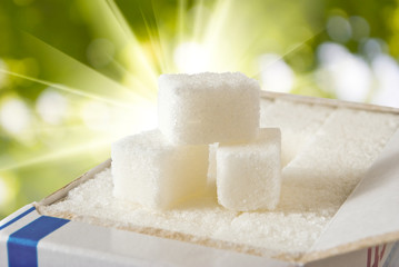 sugar on a green background closeup