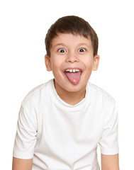 grimacing face boy portrait, teenager closeup