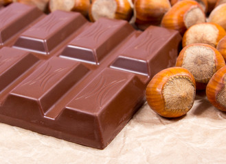 Chocolate with hazelnuts closeup.