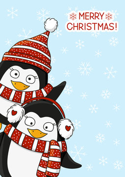 Christmas card with cute cartoon penguins 