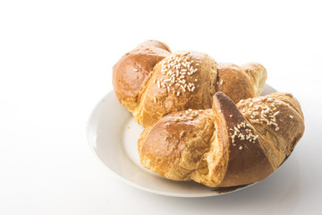 buttery croissants on a white background