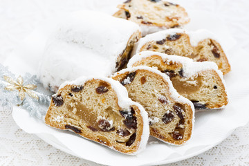 Christmas Stollen with marzipan on a plate