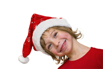 Close-up of a cute little boy with Santa hat, head sideways isol