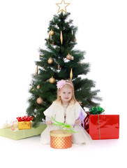 little girl at the Christmas tree