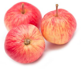 red and yellow apples on a white background