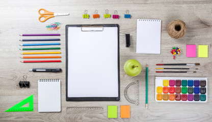 school supplies with pencils paint pens 