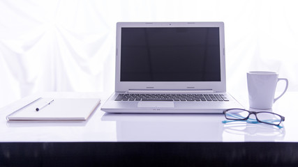 Fototapeta premium Office desk selective focus on laptop keyboard