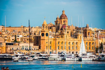 view on Birgu and the harbour with boats