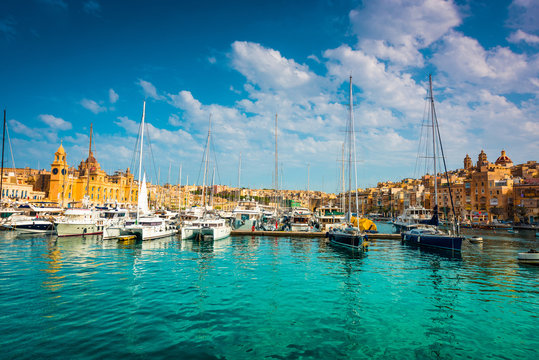 yachts near pier in Birgu