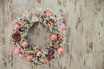 christmas wreath with pink decor and bubbles