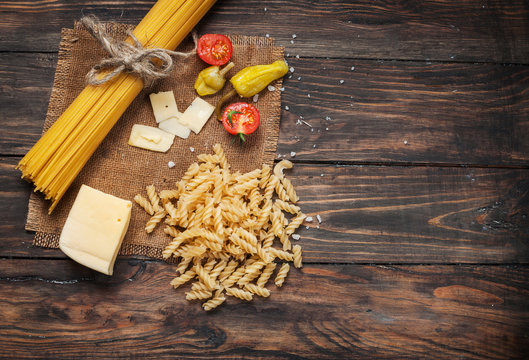 pasta products with tomato and cheese, food closeup