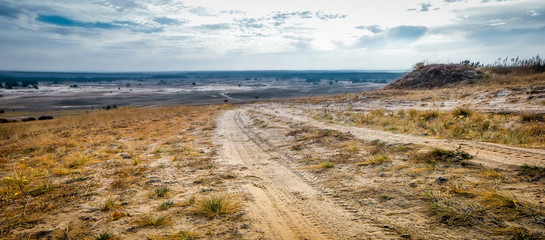 rolled road in a field