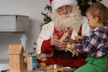 Obraz na płótnie Canvas Santa Claus with Child