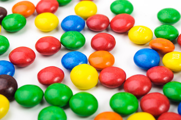 Colorful candys over white background.