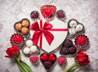 chocolate truffles with red flowers