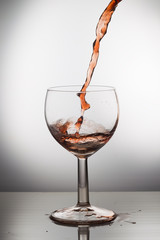 Wine pouring into a glass